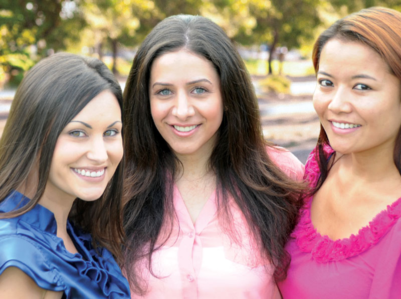 three smiling ladies